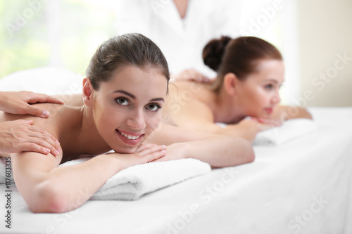 Beautiful girls relaxing in spa salon