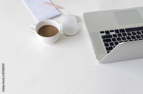 Laptop on white table