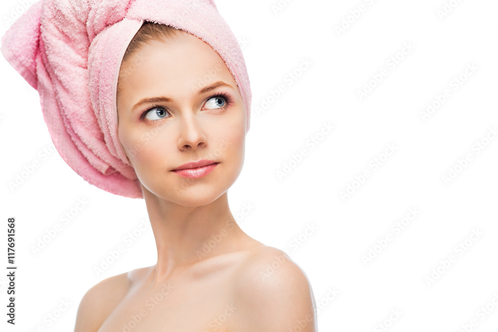 Face of young woman with a towel Face of young woman with a towel