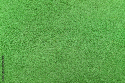Closeup texture of artificial Putting green grass. Abstract background photo of golf turf.