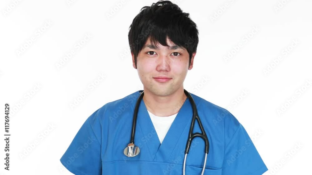 指示する笑顔の医師 指示する笑顔の医師