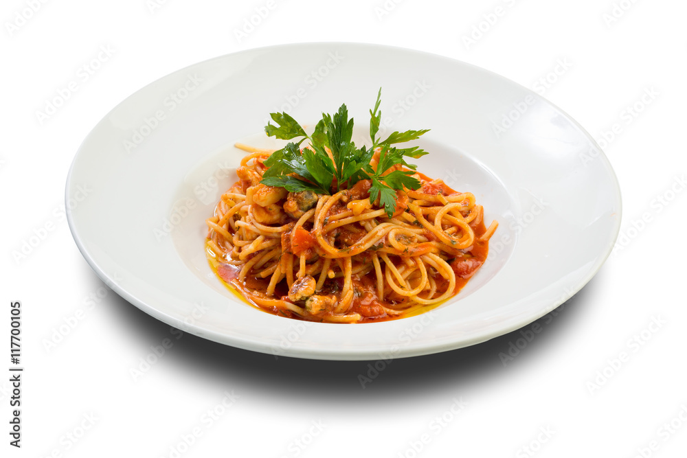 pasta with seafood with mussels and shrimp in tomato sauce on a white plate and a white background pasta with seafood with mussels and shrimp in tomato sauce on a white plate and a white background