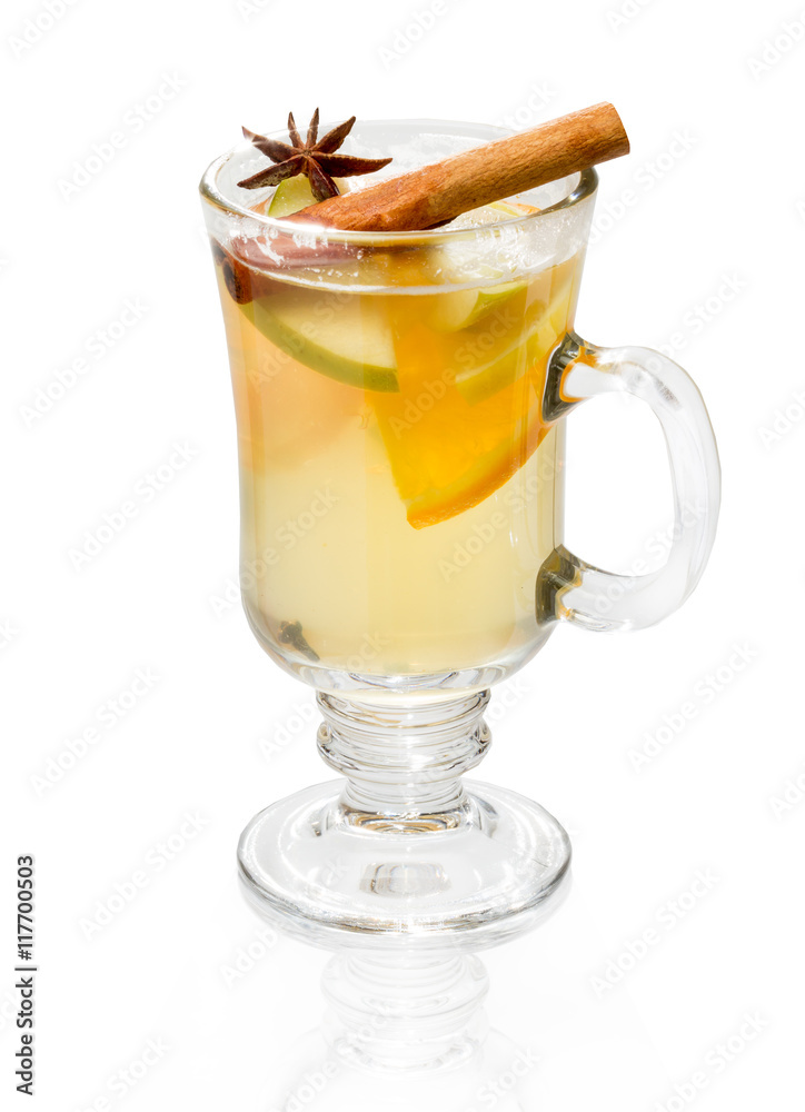 Stamp with slices of orange and apple, cardamom and cinnamon. In a glass beaker. Stamp with slices of orange and apple, cardamom and cinnamon. In a glass beaker.