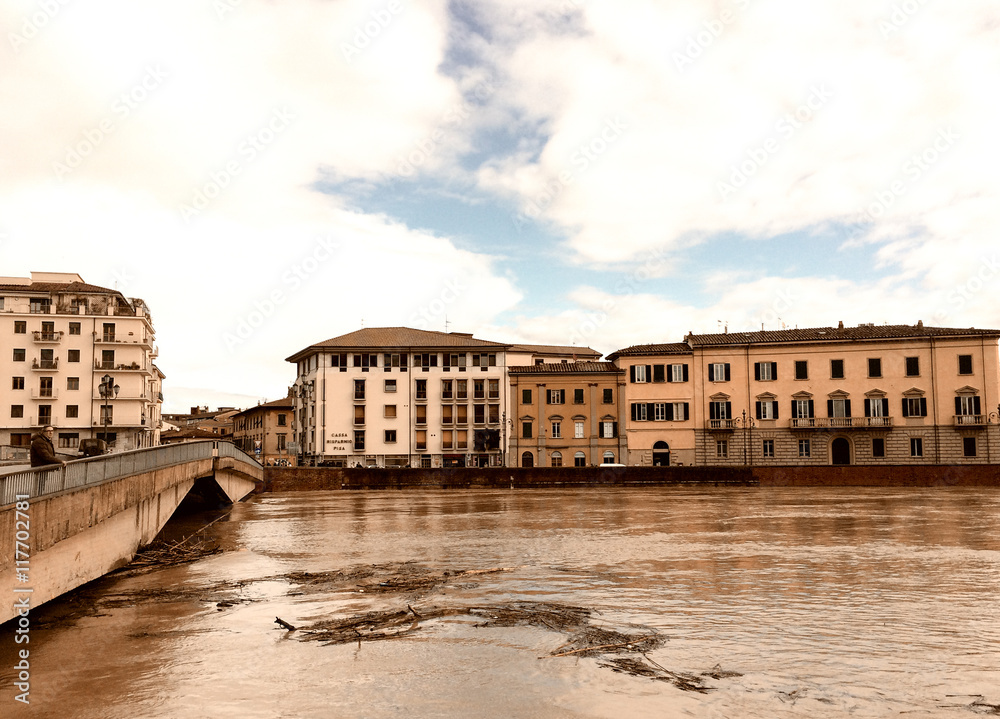 PISA, ITALY - FEBRUARY 2014: Arno river after massive rain preci