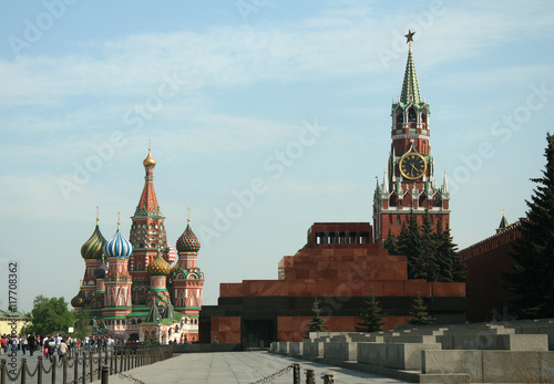 Kremlin tower with chime on the red square and The Cathedral of Intercession of the Virgin on the Moat , Moscow