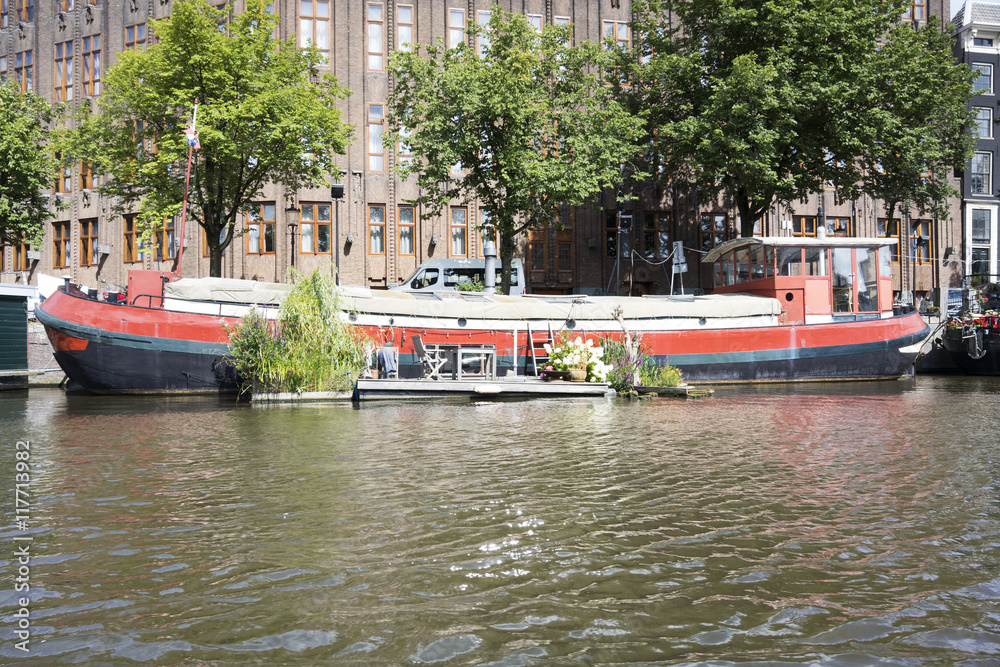 Naklejka premium Amsterdam by boat