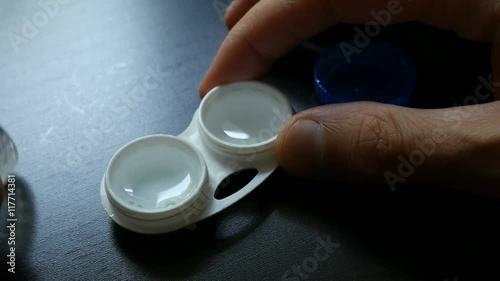 Take the lens out of the container for lenses