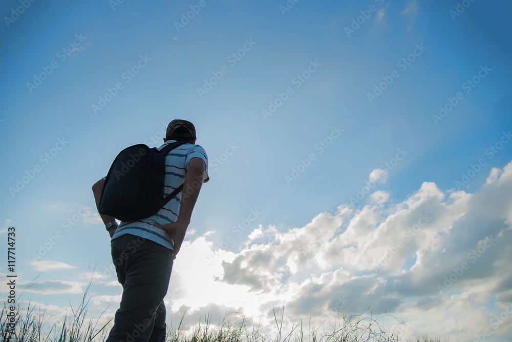 man travelling in nature with backpack man travelling in nature with backpack