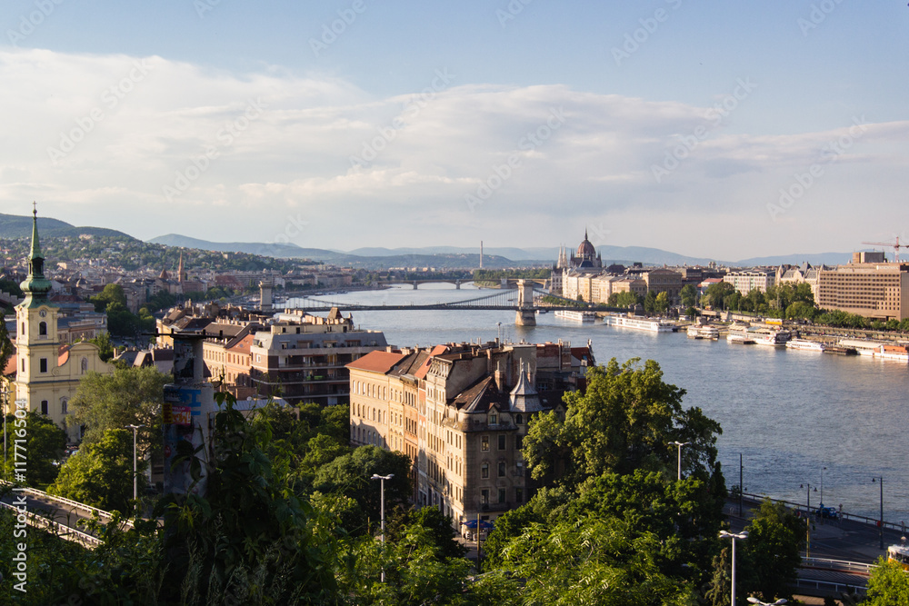 Fototapeta premium cityscape landscape of bridges over Donau river in Budapest, Hungary during sunset
