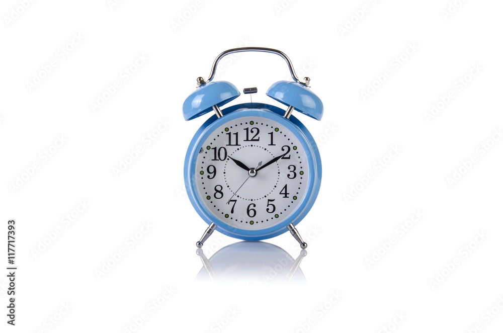 Alarm clock in time concept isolated on white Alarm clock in time concept isolated on white