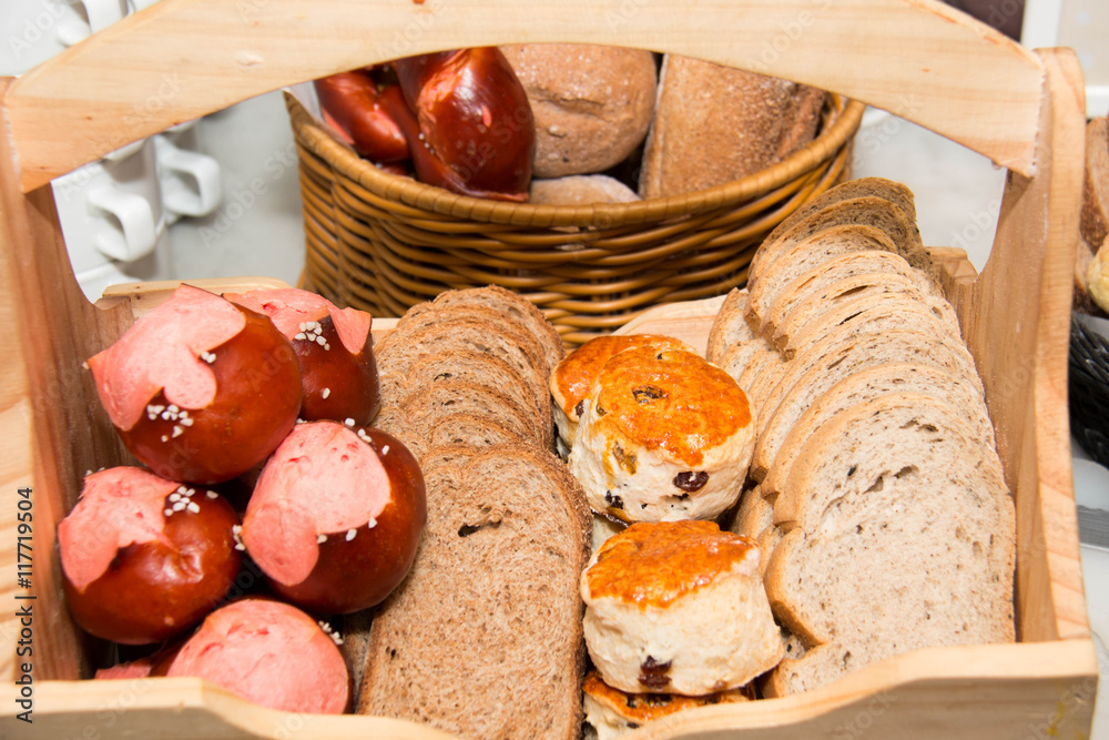 Loaves of bread in a wood basket