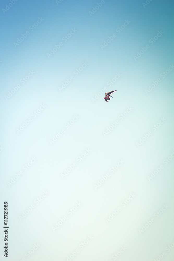 Fototapeta premium Paragliders flying with paramotor