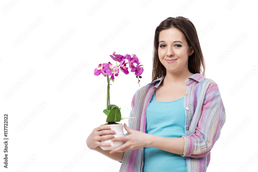Young woman taking care of plants isolated on white Young woman taking care of plants isolated on white