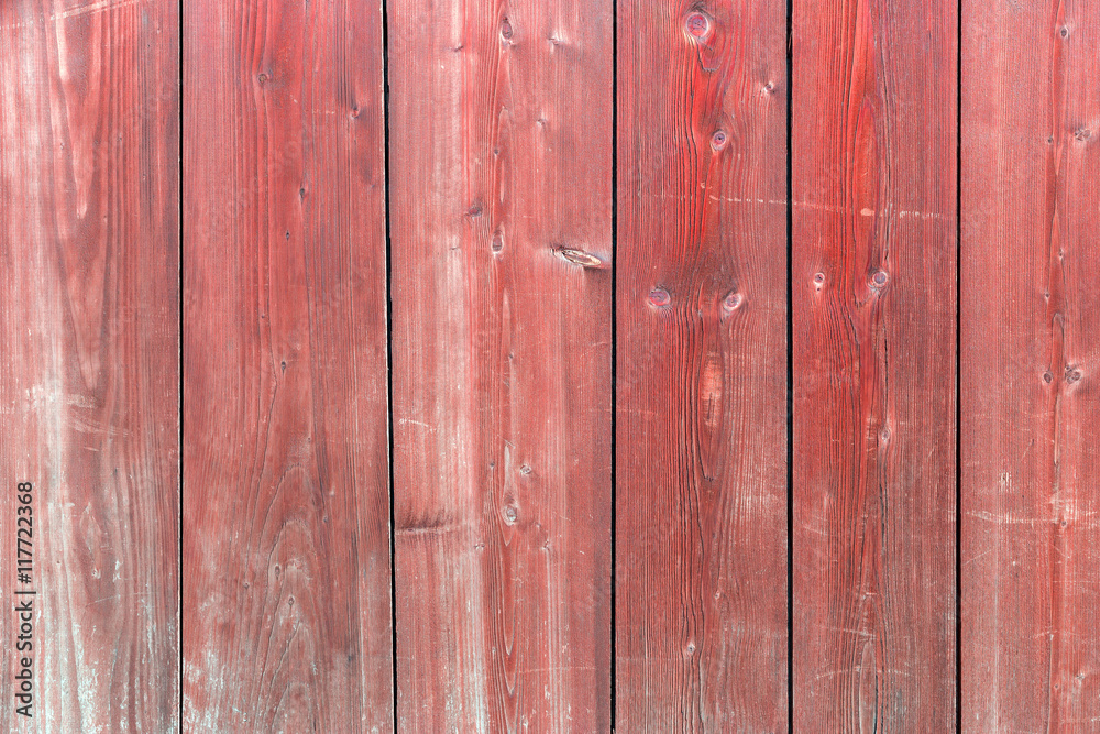 The old red wood texture with natural patterns The old red wood texture with natural patterns