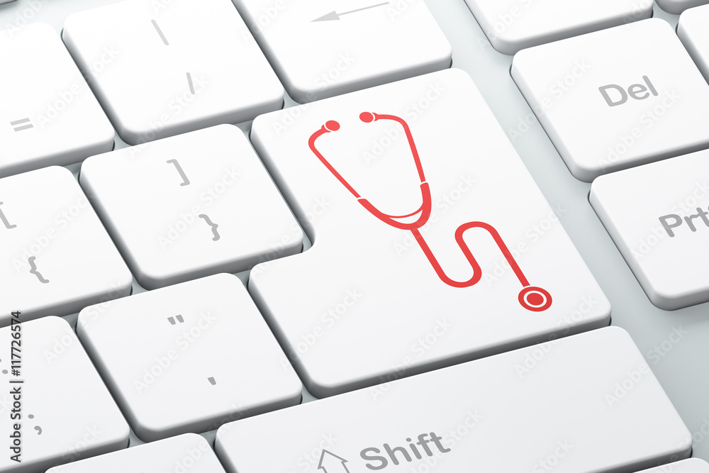 Health concept: Stethoscope on computer keyboard background Health concept: Stethoscope on computer keyboard background