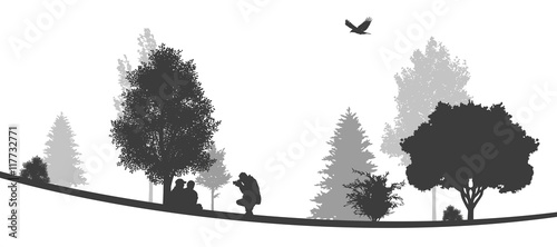 Fotograf macht Fotos von Menschen im Park