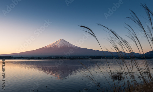Mountain Fuji and reflections on lake Kawaguchi at dawn