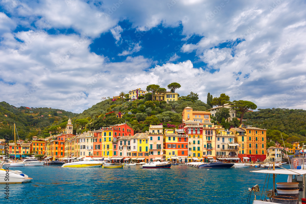 Panoramic view of picturesque harbour of Portofino fishing village on the Italian Riviera, Liguria, Italy.
