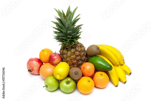 pineapple and other fruits isolated on white background