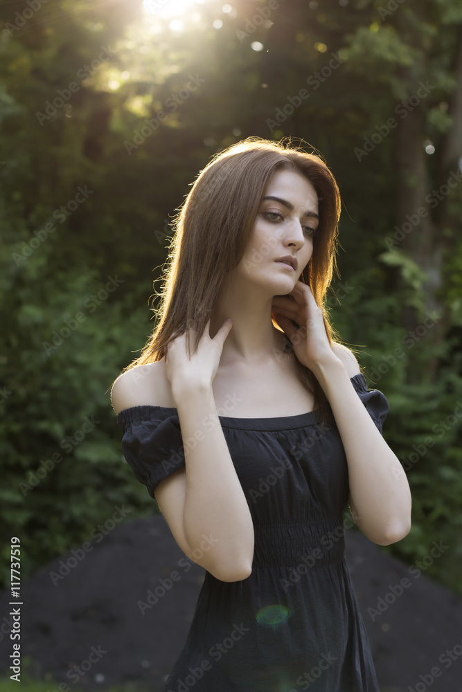 Attractive woman in a rays of sun Attractive woman in a rays of sun