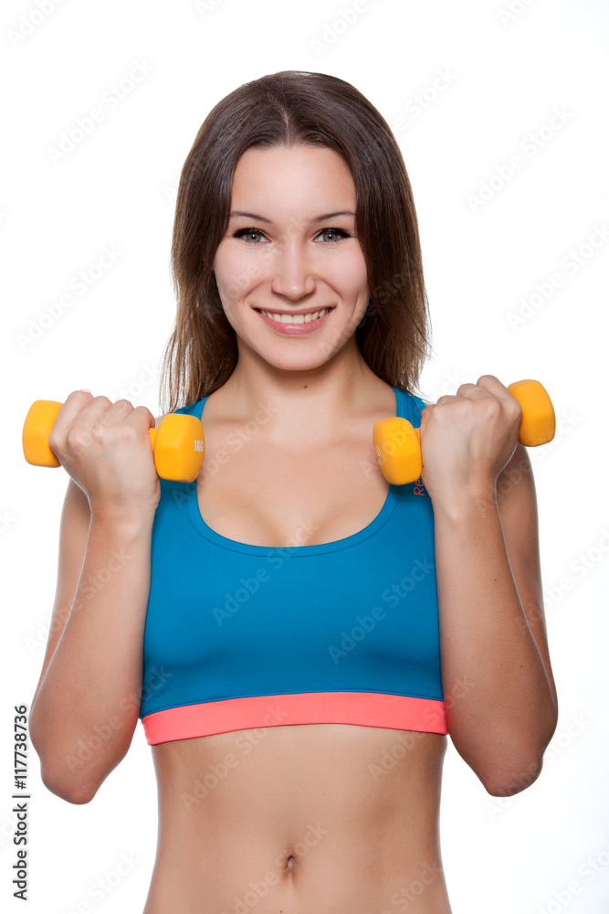 Young sporty girl does exercise. Young sporty girl does exercise.