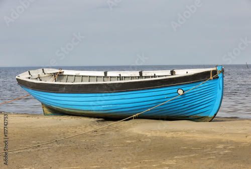 fishing boats on the shore of the White Sea photo
