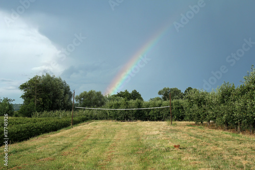 rural landscape with rainbow