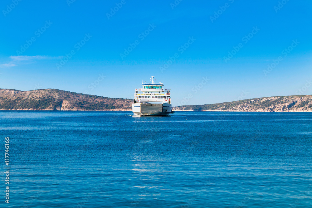 Passenger ferry boat between islands of Cres and Krk on Adriatic sea in Croatia