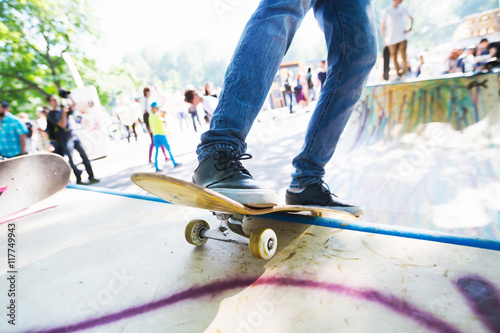 Man riding on a skateboard. Skatepark