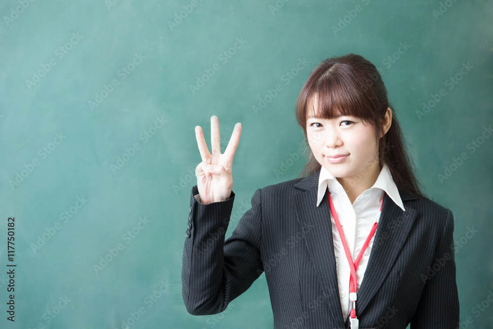 女性教師・黒板 女性教師・黒板