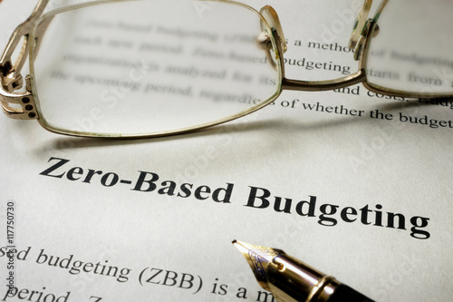 Sign Zero-Based Budgeting - ZBB on a paper and glasses.