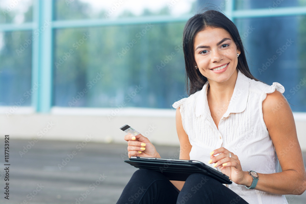 Internet shopping woman online with tablet pc and credit card Internet shopping woman online with tablet pc and credit card