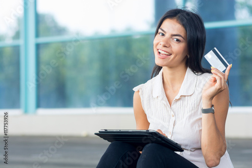 Internet shopping woman online with tablet pc and credit card