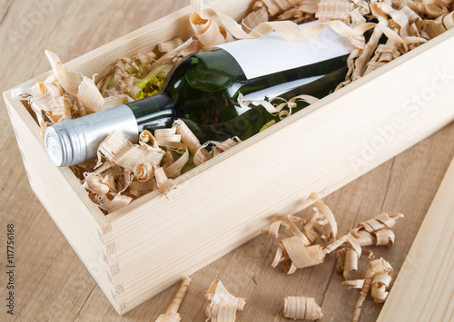 Wine bottle in wooden box