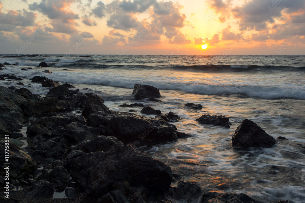 Sunrise on a beach in Pomos