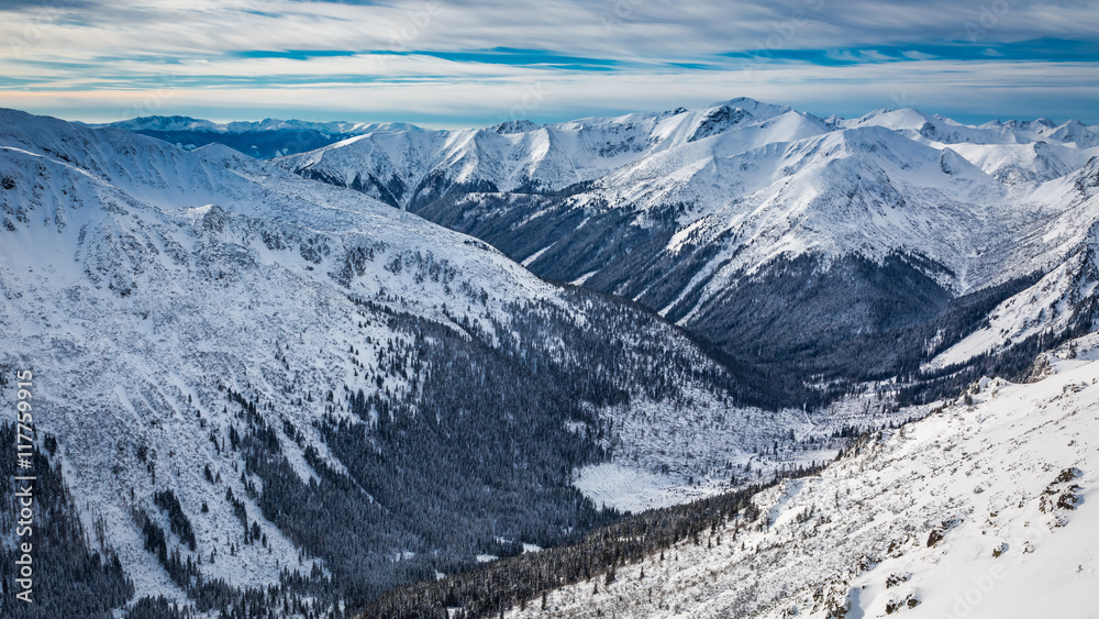 Winter view of the valley from Kasprowy Wierch in Tatra Mountains, Poland