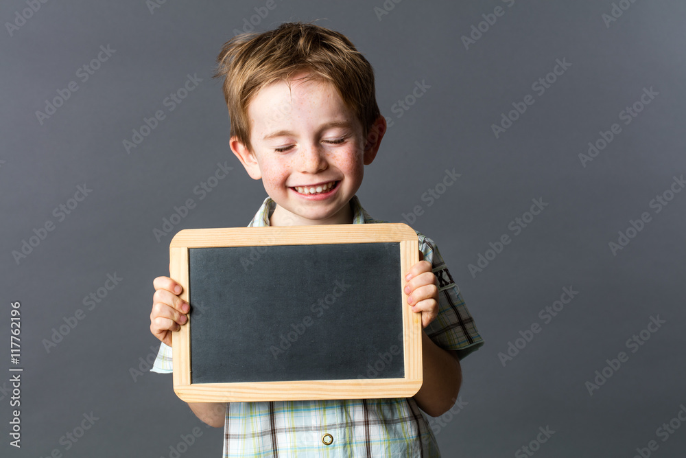 smiling child closing eyes for meditation or relaxation at preschool smiling child closing eyes for meditation or relaxation at preschool