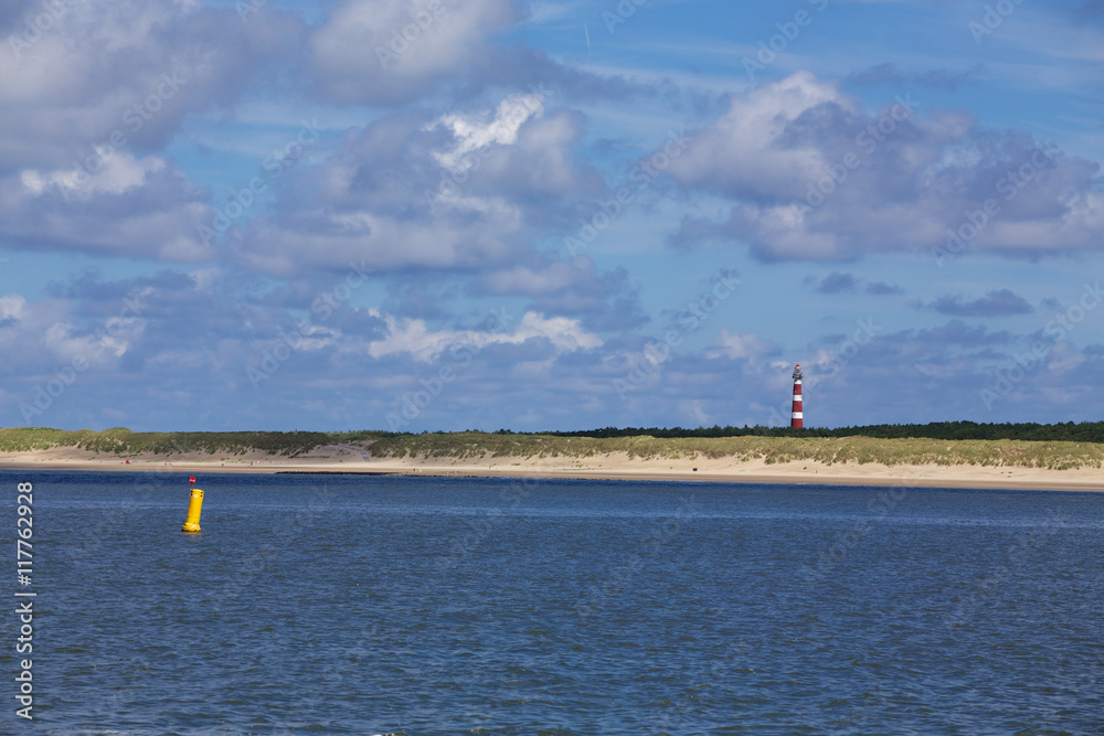 Obraz premium Leuchtturm Ameland aus der Ferne