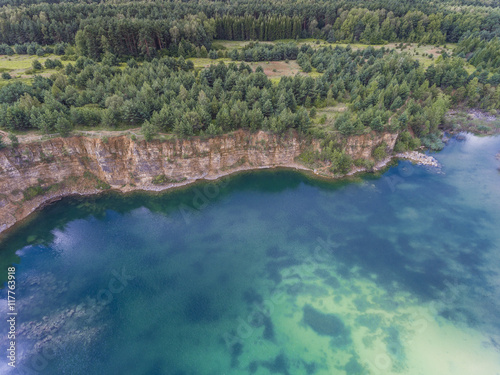 Blue laggon see from above in old sand mine in Poland.