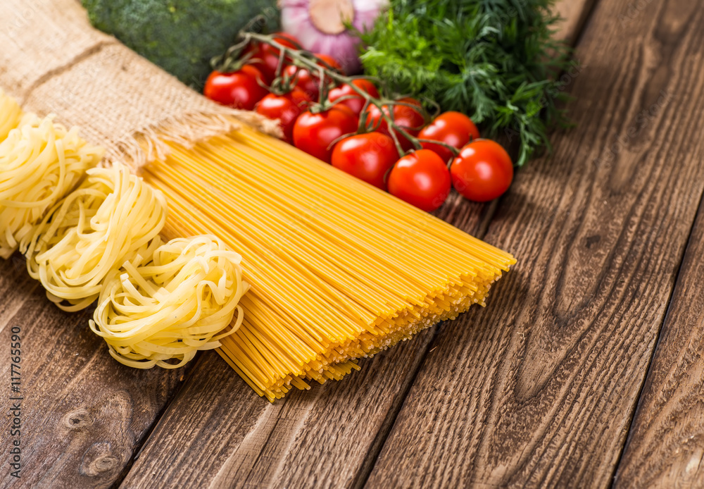 The composition of the pasta and vegetables on a white backgroun The composition of the pasta and vegetables on a white backgroun