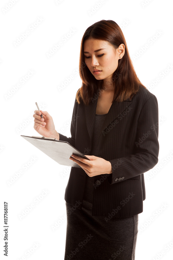 Young Asian business woman with pen and clipboard. Young Asian business woman with pen and clipboard.