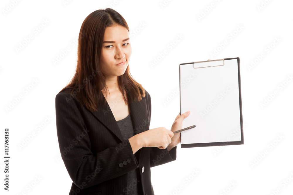 Unhappy Asian business woman point to clipboard with pen. Unhappy Asian business woman point to clipboard with pen.
