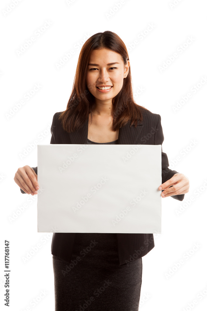 Young Asian business woman with white blank sign. Young Asian business woman with white blank sign.