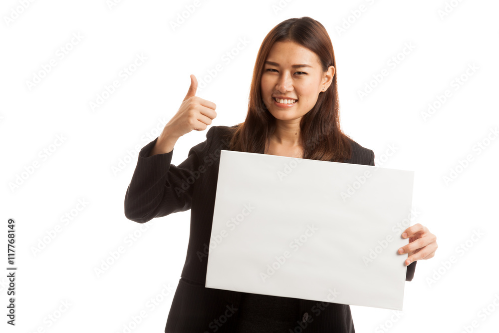 Young Asian business woman show thumbs up with white blank sign Young Asian business woman show thumbs up with white blank sign