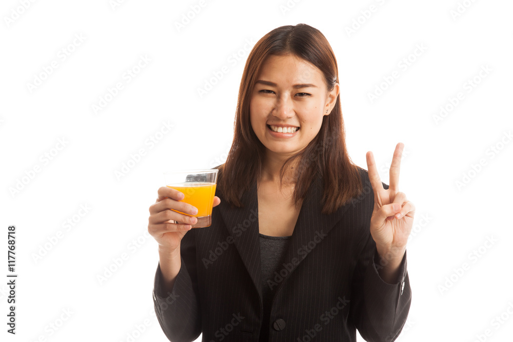 Young Asian woman show victory sign drink orange juice. Young Asian woman show victory sign drink orange juice.