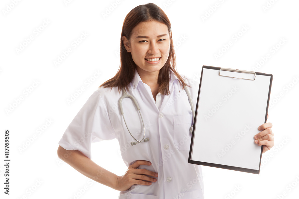 Young Asian female doctor show a blank clipboard. Young Asian female doctor show a blank clipboard.