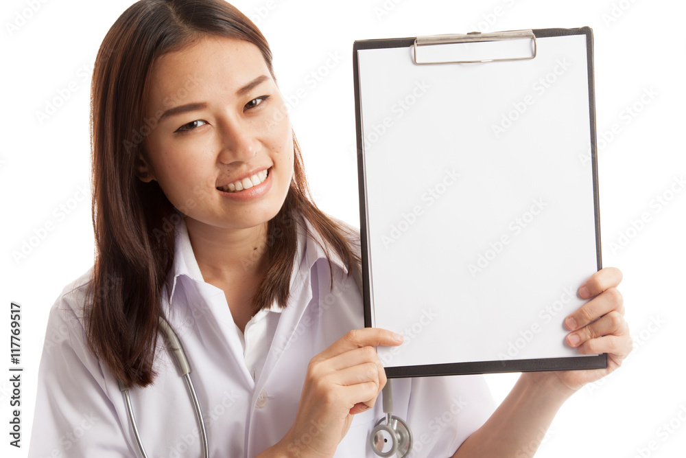 Young Asian female doctor show a blank clipboard. Young Asian female doctor show a blank clipboard.