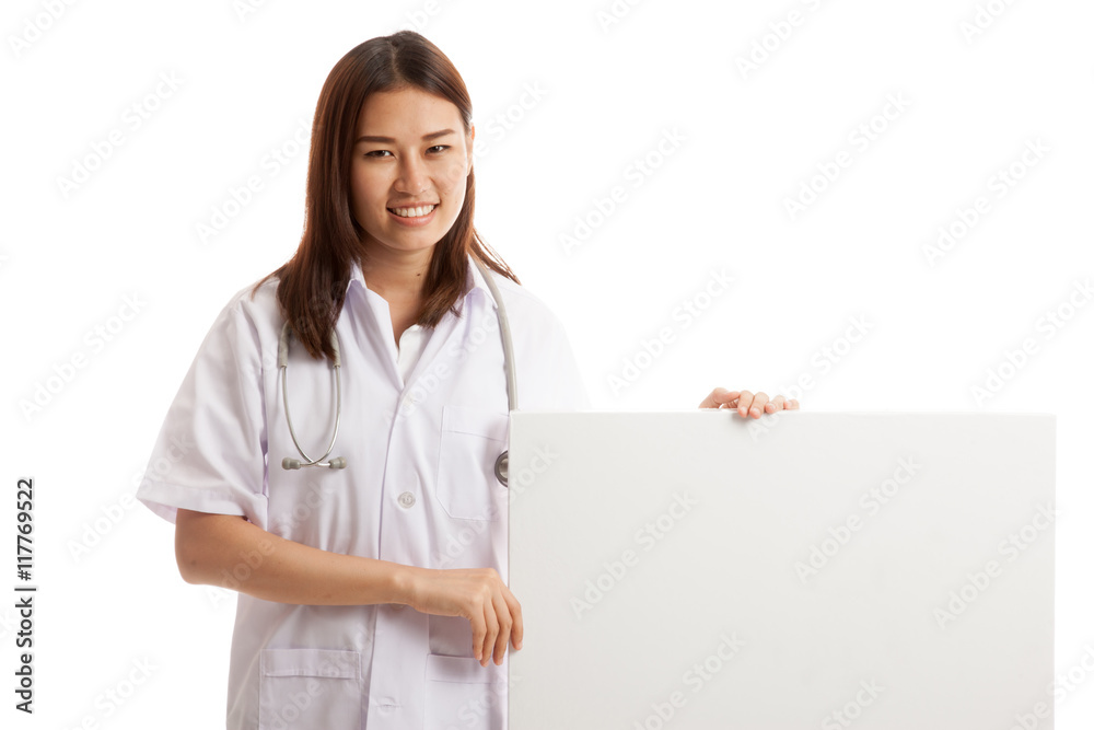 Young Asian female doctor hold a blank sign. Young Asian female doctor hold a blank sign.