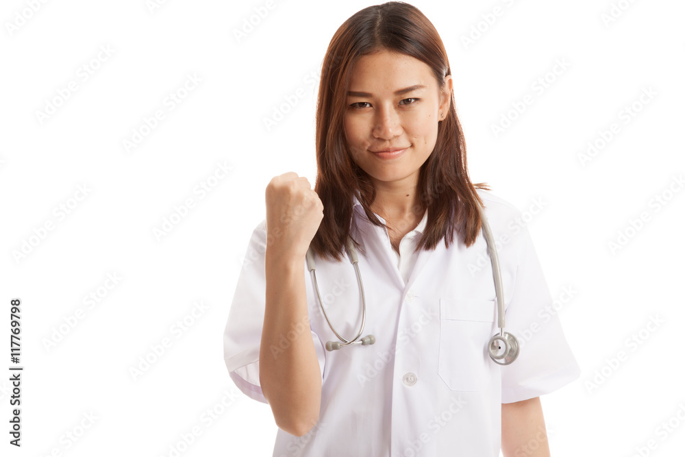 Portrait of confidence young female doctor hold fist. Portrait of confidence young female doctor hold fist.