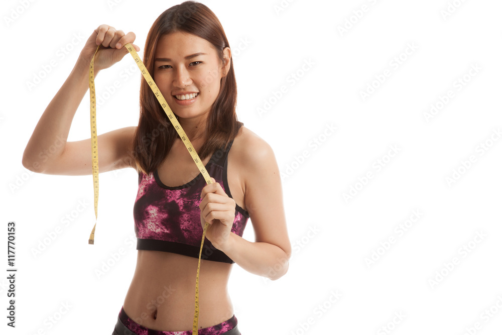 Beautiful Asian healthy girl with measuring tape. Beautiful Asian healthy girl with measuring tape.